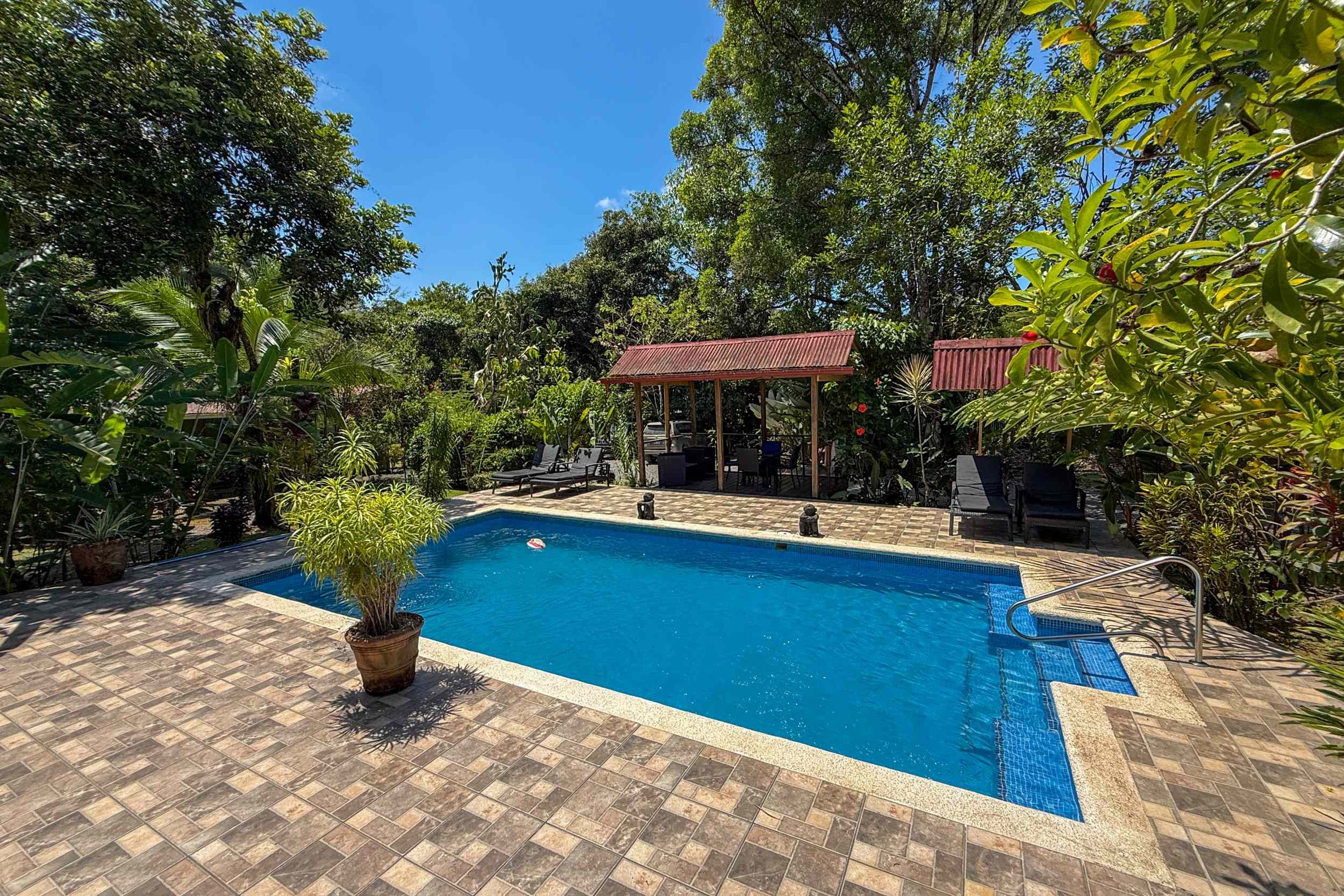Pool & Palapa Lounge Jungle Hotel pool with palapa lounge area in Ojochal, Costa Rica