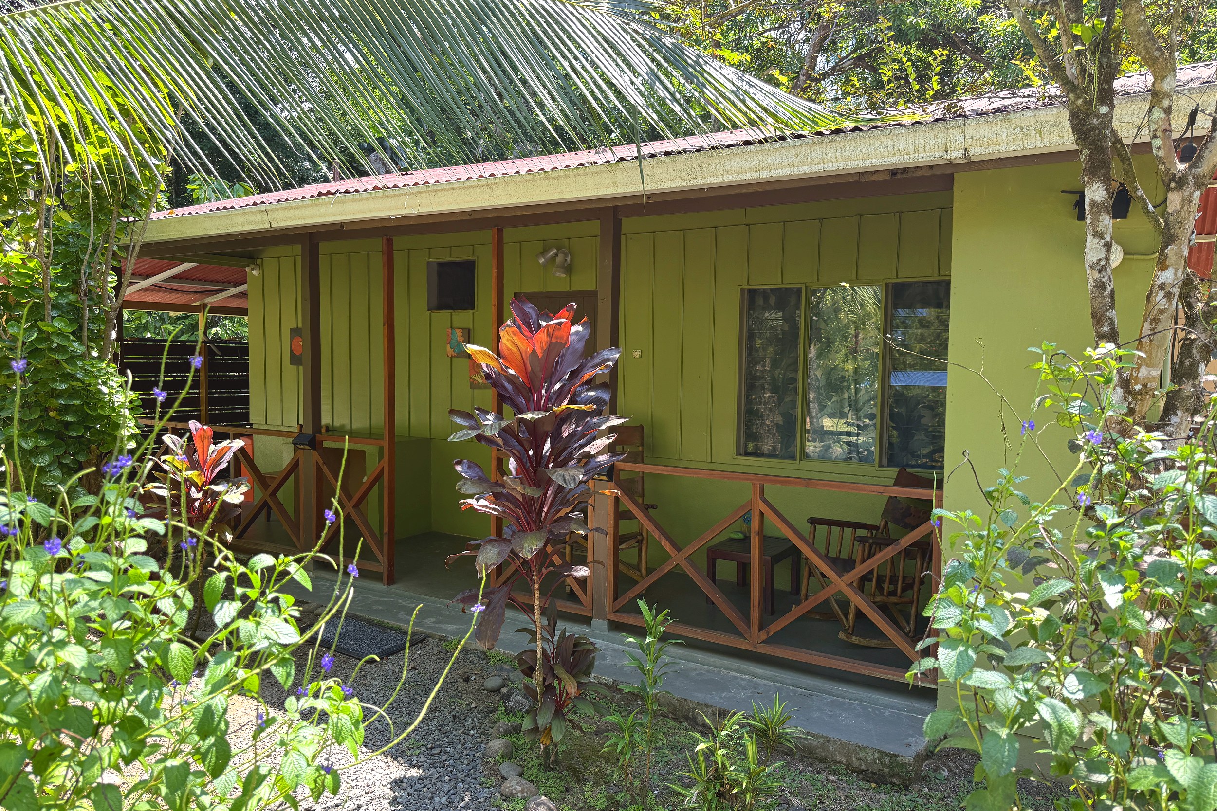Jungle Bungalow Exterior Gorgeous Jungle Hotel bungalow exterior with tin roof and porch in Ojochal, Costa Rica