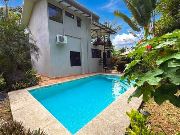 Jungle Sanctuary Pool Home private pool and balcony amid lush greenery in Ojochal, Costa Rica