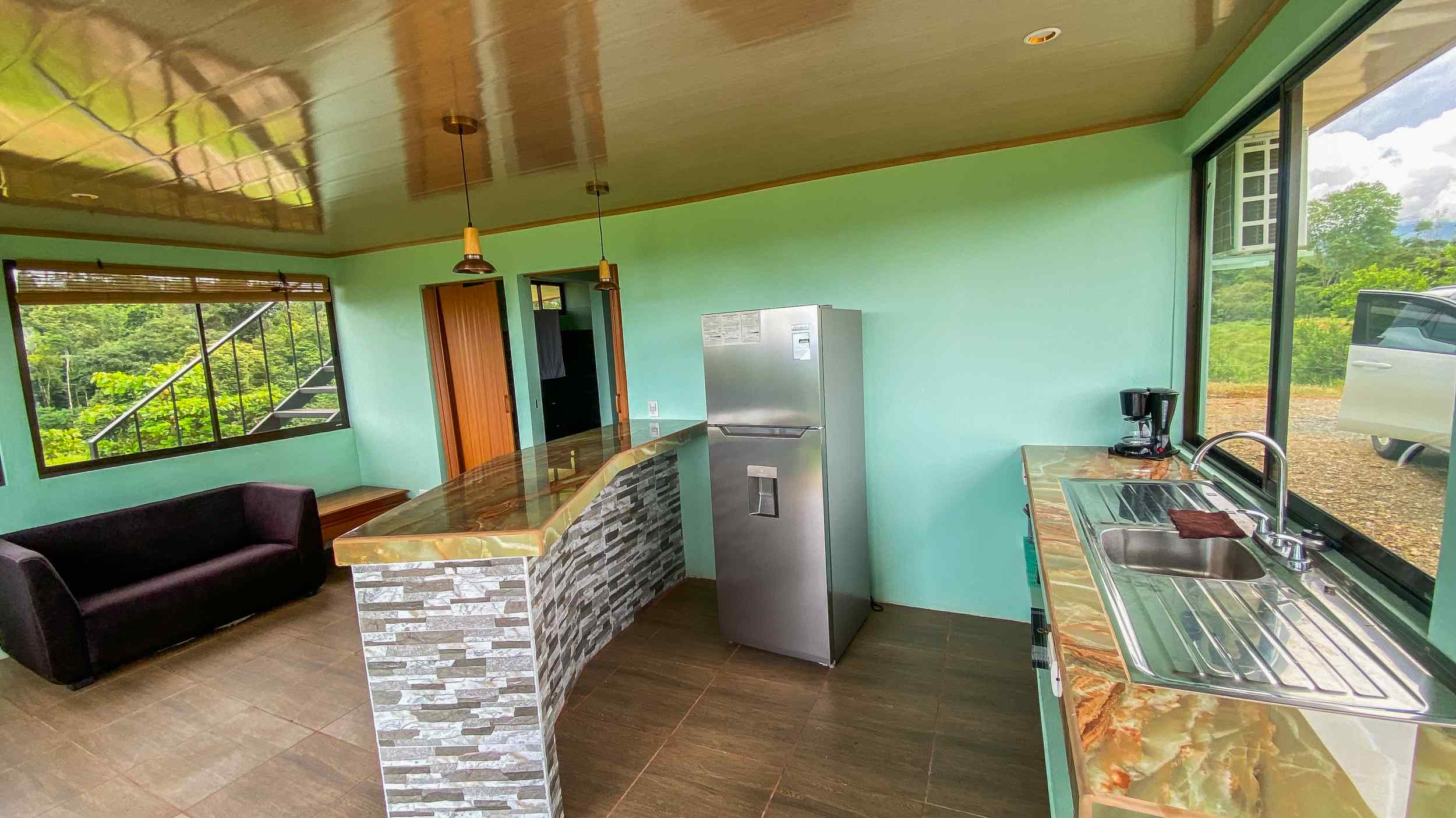 71996-5 Stunning 2-Bedroom Ranch with Panoramic Views & Legal ASADA Water in Palmar Norte Costa Rica