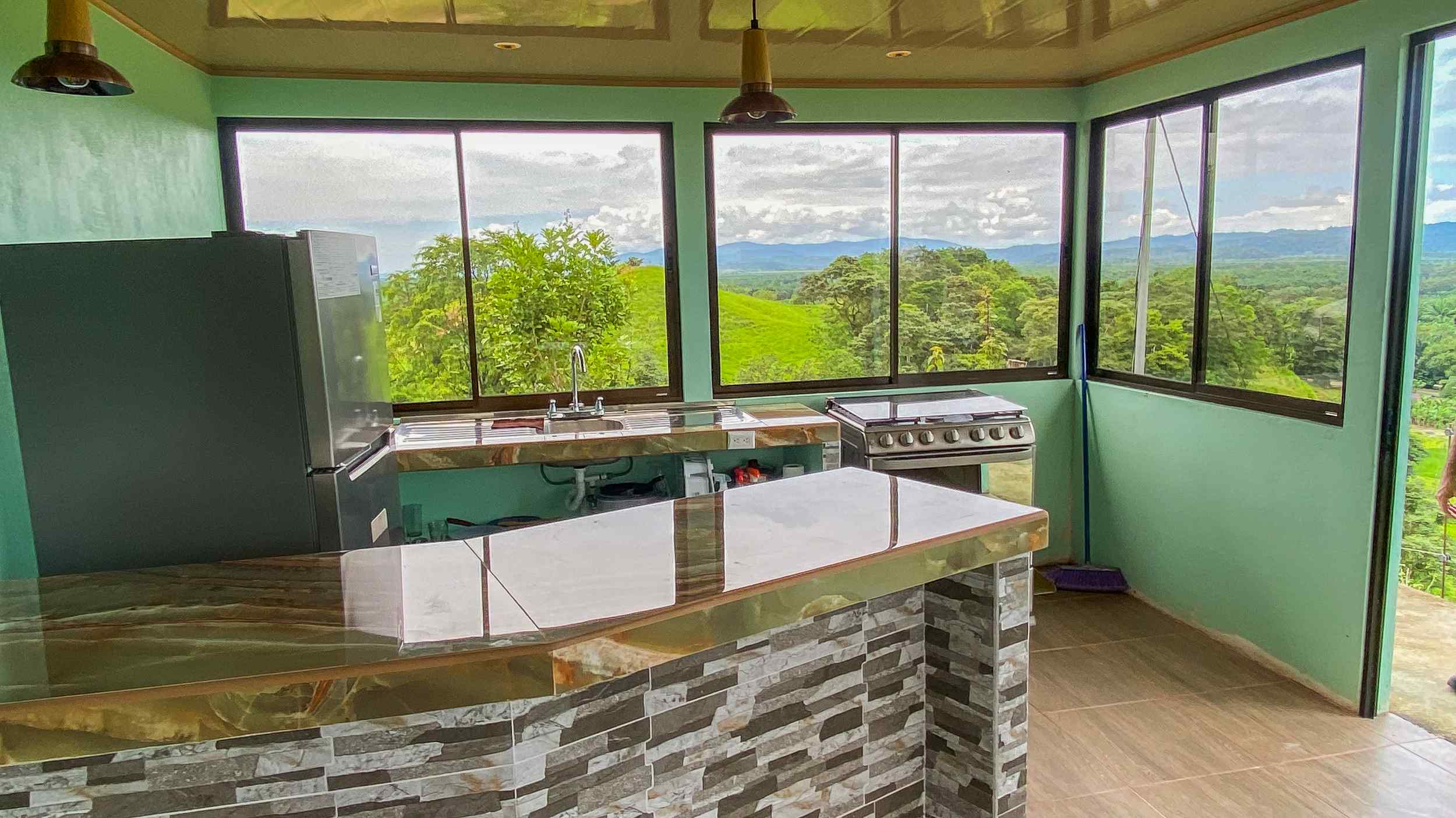71996-8 Stunning 2-Bedroom Ranch with Panoramic Views & Legal ASADA Water in Palmar Norte Costa Rica