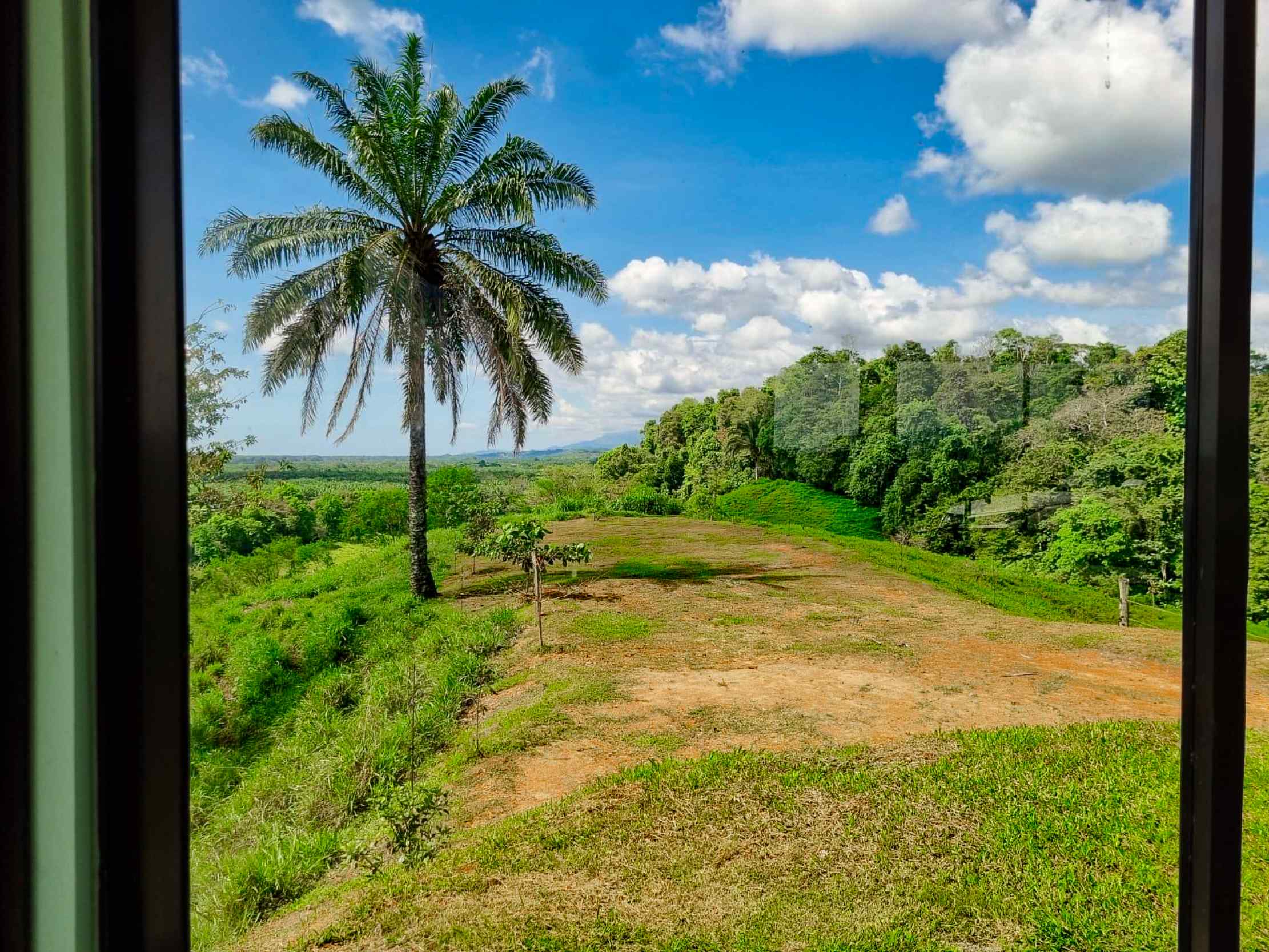 71996-11 Stunning 2-Bedroom Ranch with Panoramic Views & Legal ASADA Water in Palmar Norte Costa Rica