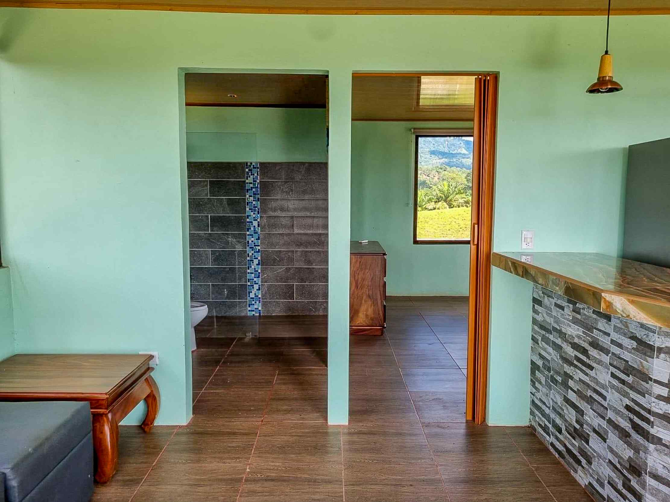 71996-13 Stunning 2-Bedroom Ranch with Panoramic Views & Legal ASADA Water in Palmar Norte Costa Rica