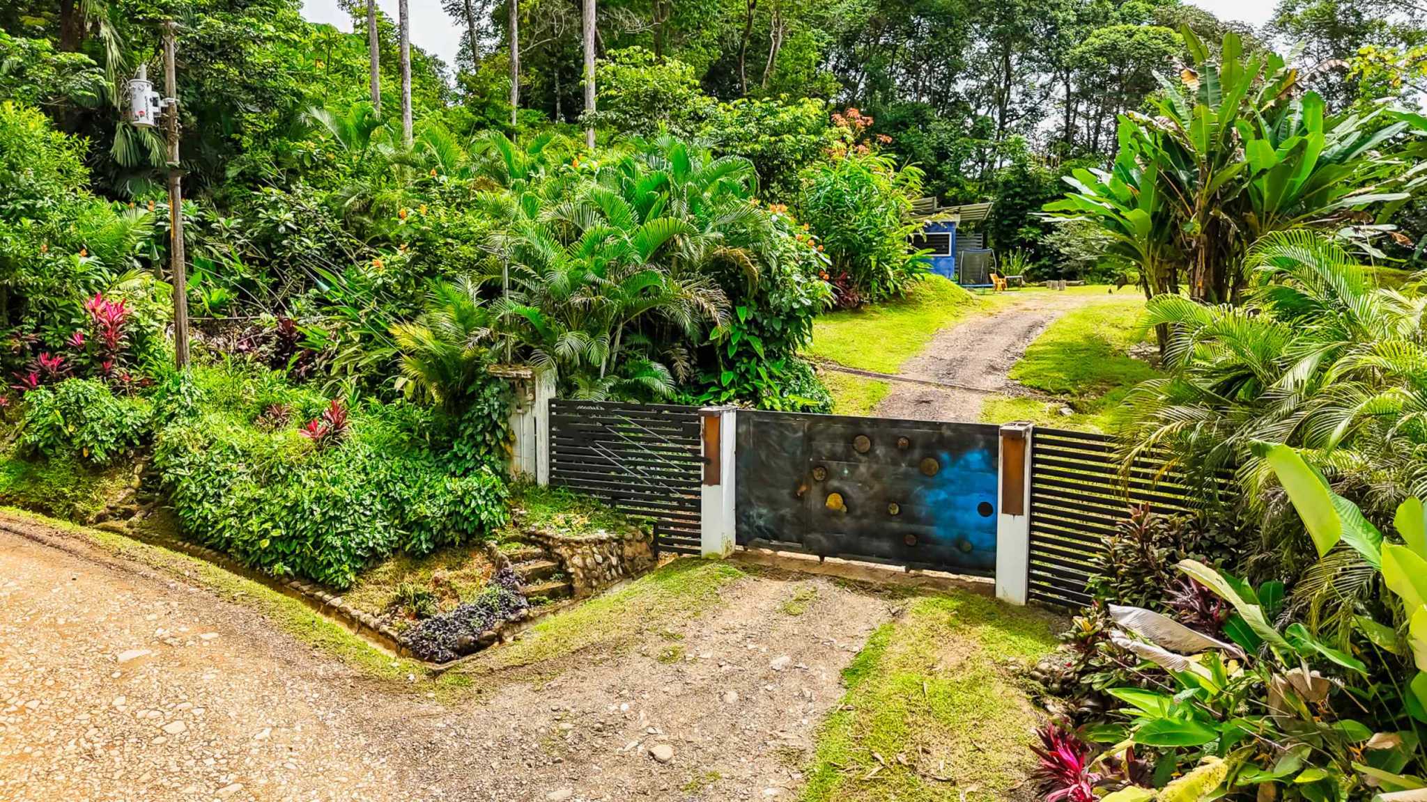 72256-2 Tranquil 2+ Acre Building Lot with Simple Home and Legal Water in Ojochal Costa Rica