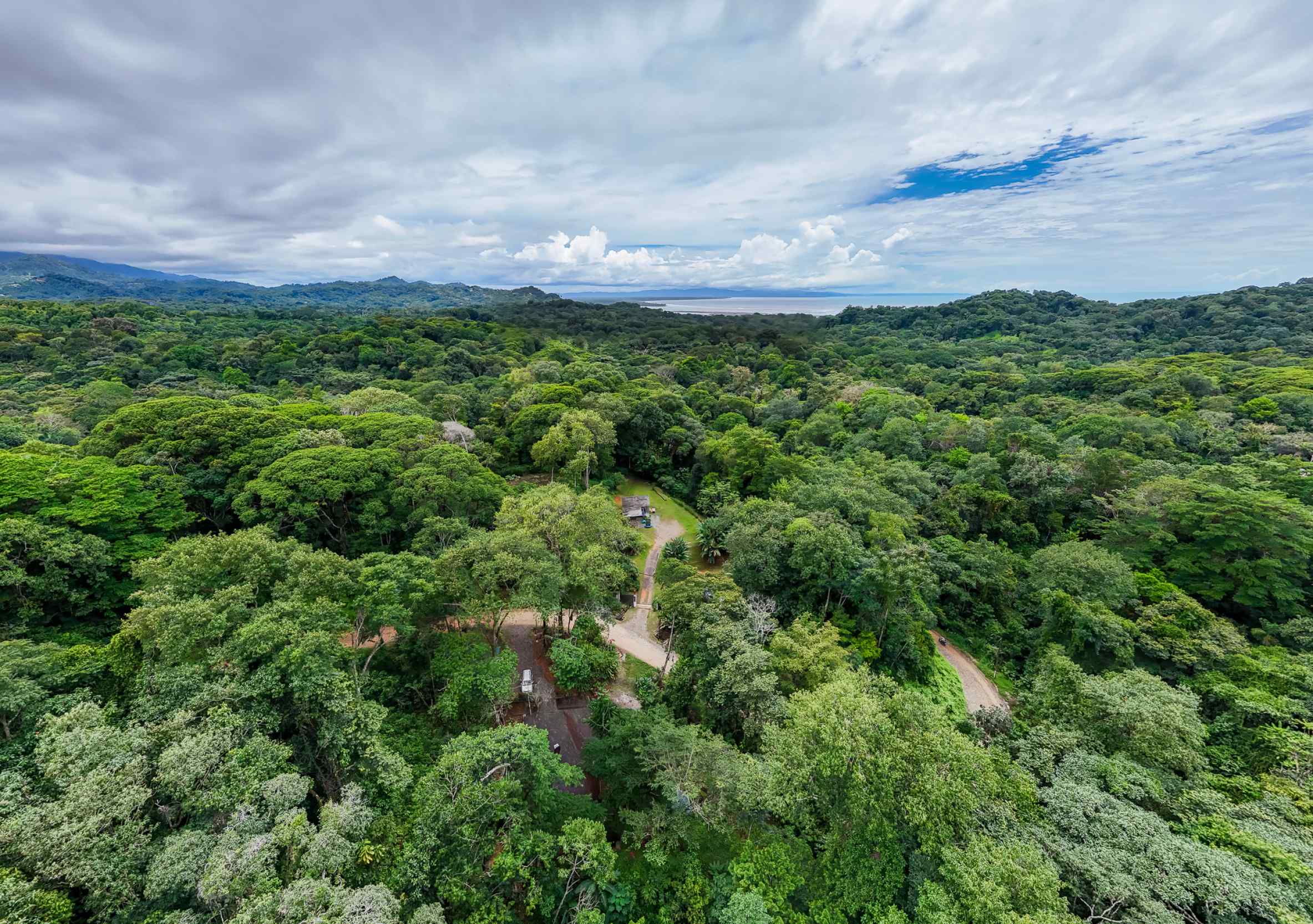 Tranquil 2+ Acre Building Lot with Simple Home and Legal Water in Ojochal Costa Rica