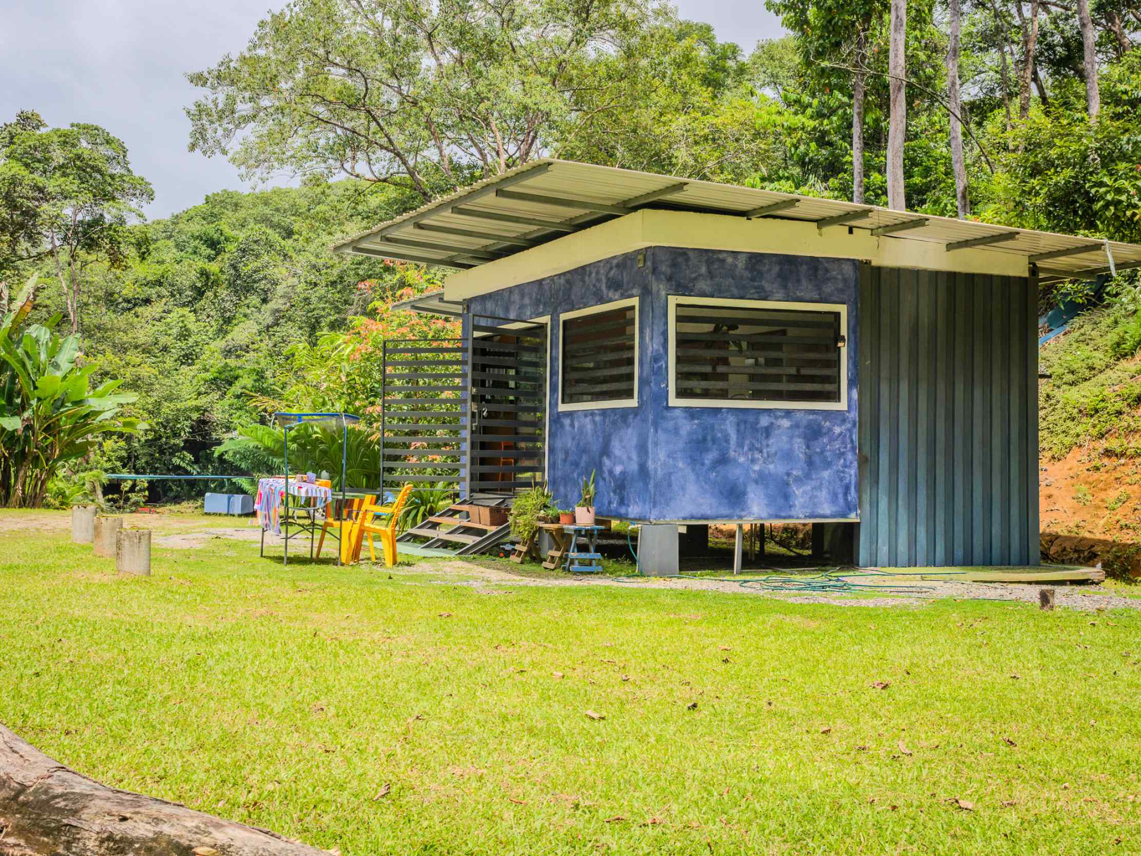 Tranquil 2+ Acre Building Lot with Simple Home and Legal Water in Ojochal Costa Rica