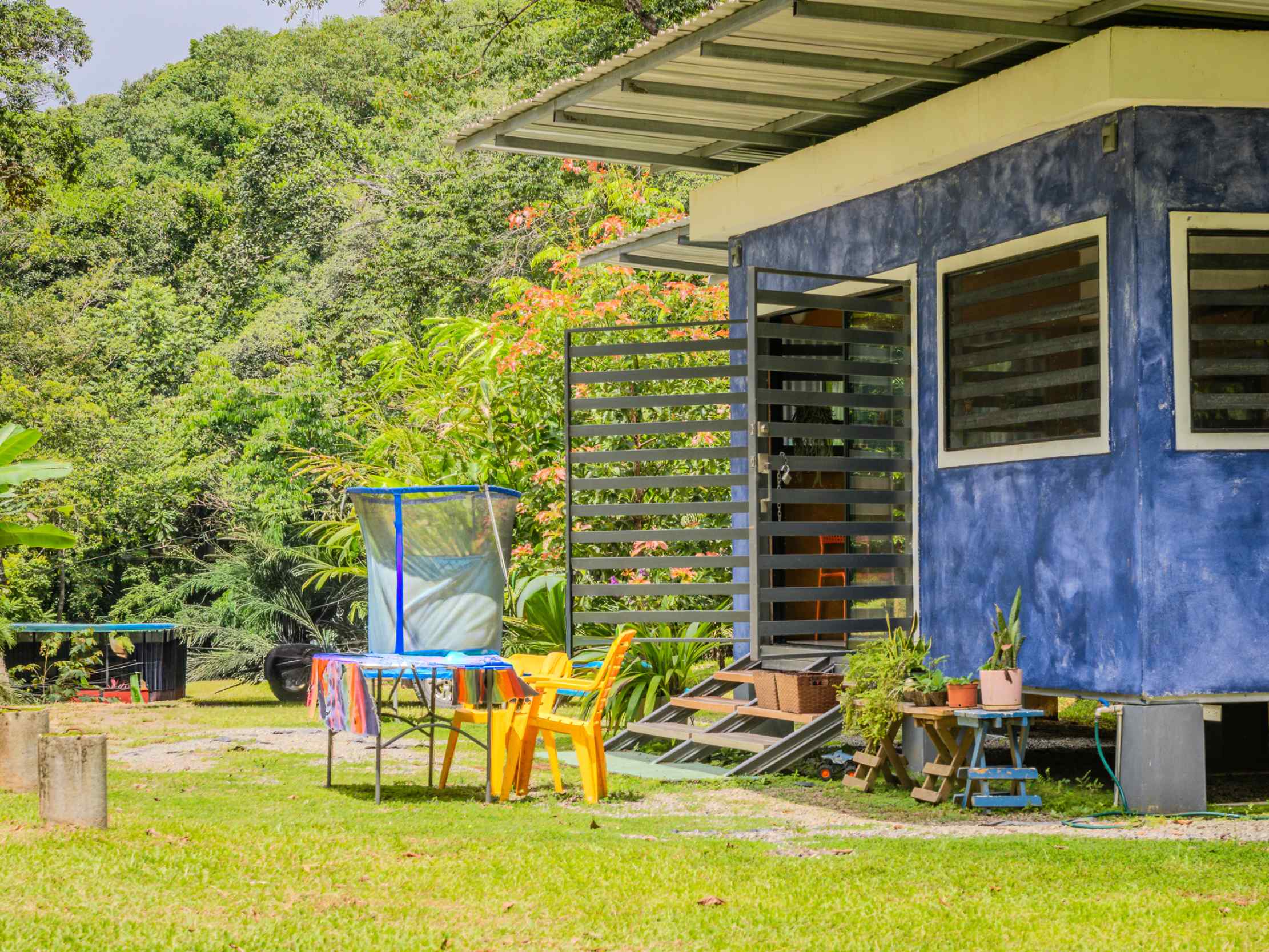 Tranquil 2+ Acre Building Lot with Simple Home and Legal Water in Ojochal Costa Rica