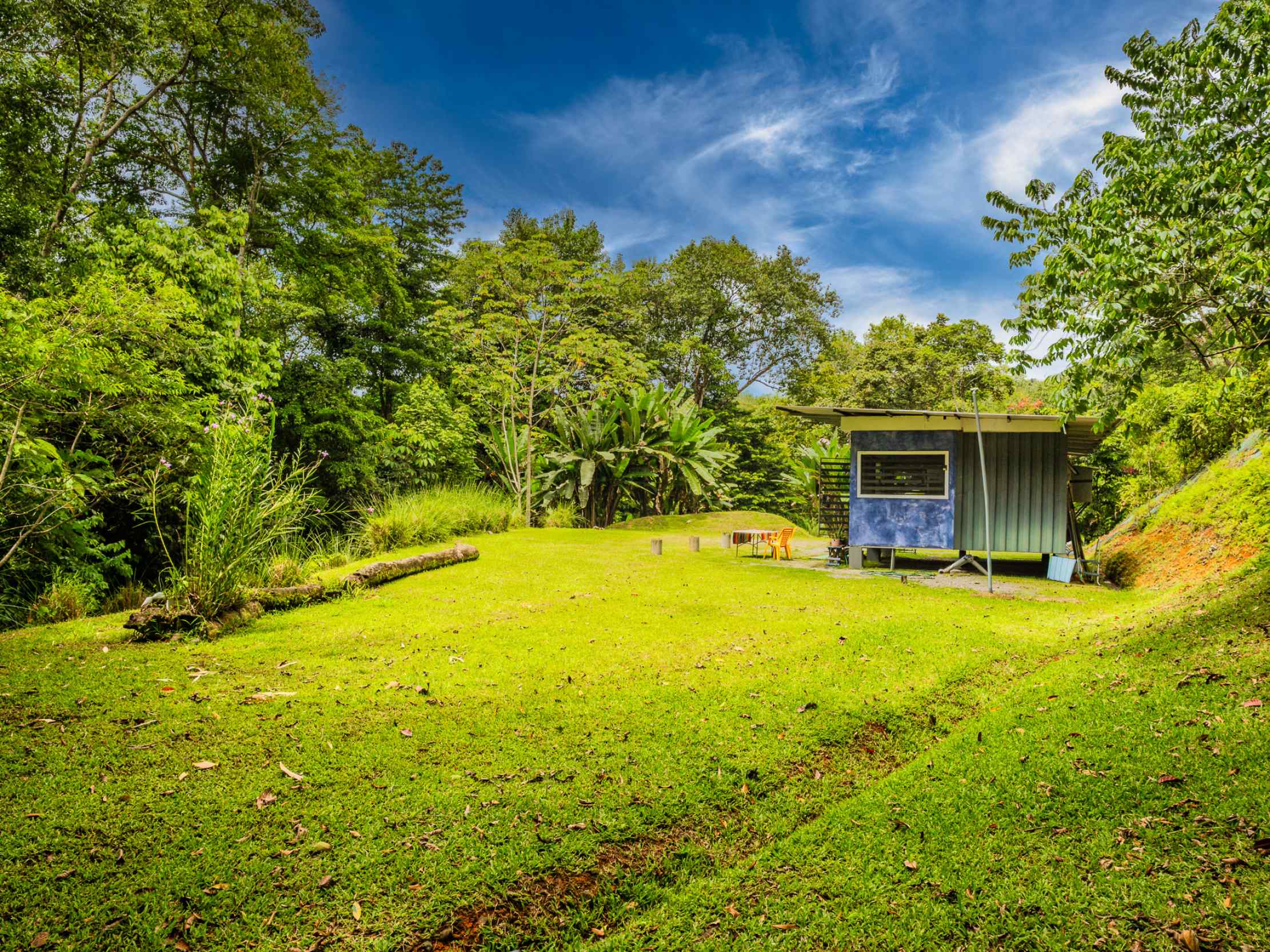 Tranquil 2+ Acre Building Lot with Simple Home and Legal Water in Ojochal Costa Rica