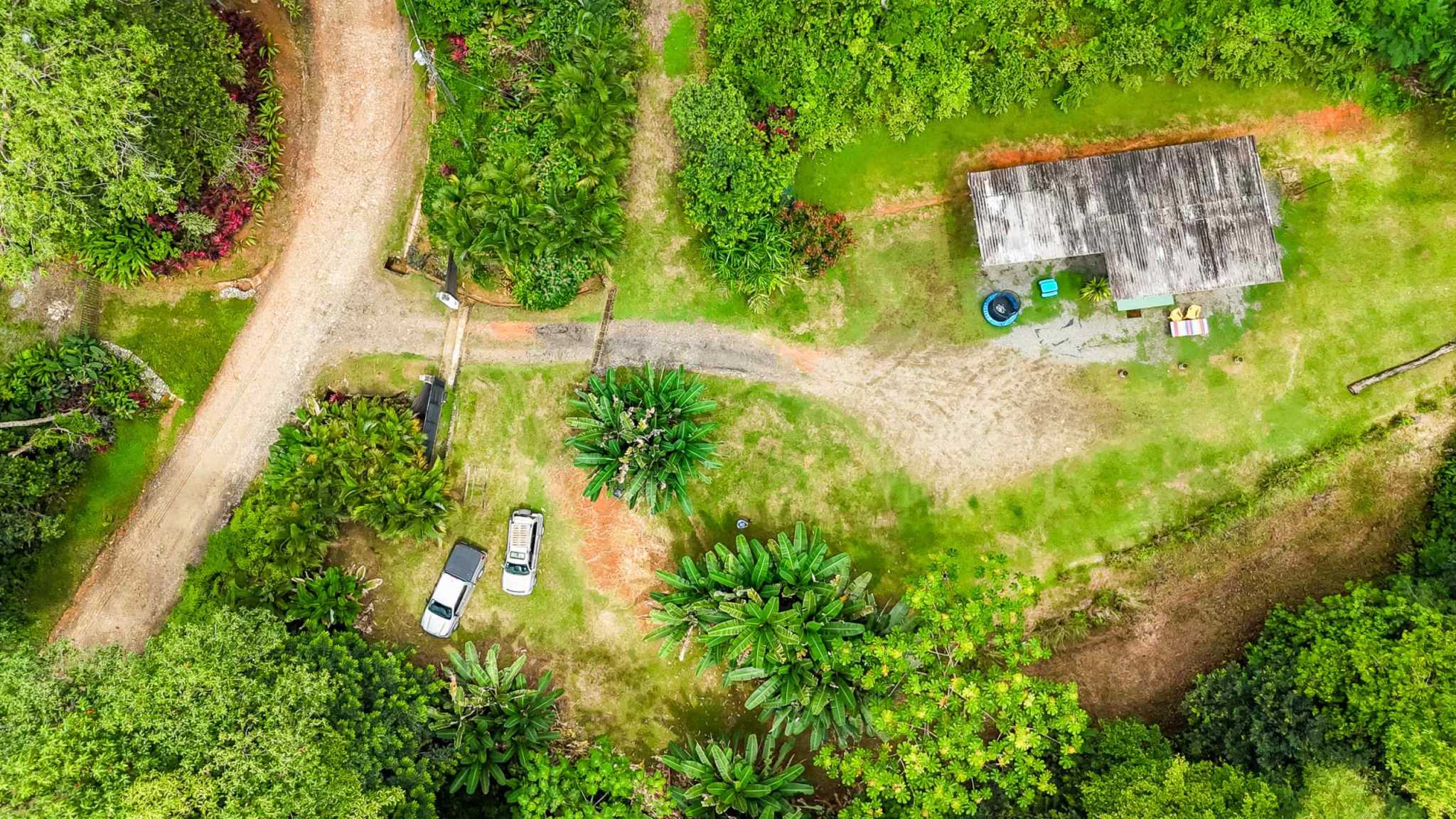 72256-19 Tranquil 2+ Acre Building Lot with Simple Home and Legal Water in Ojochal Costa Rica