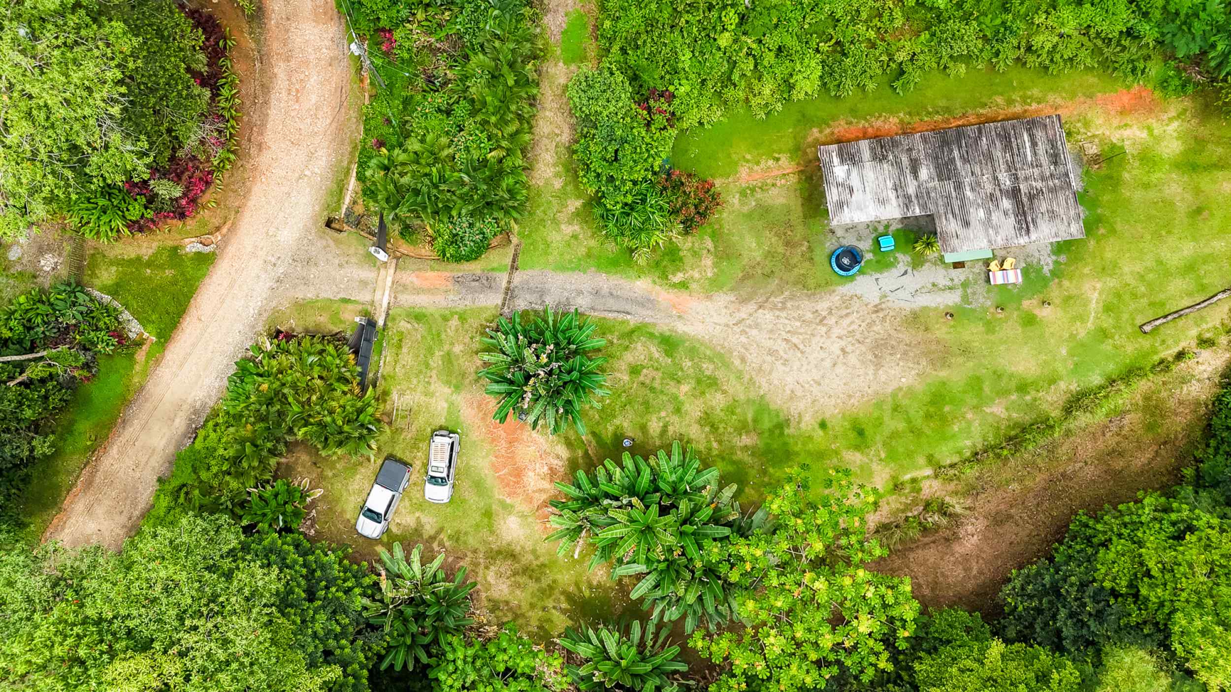 Tranquil 2+ Acre Building Lot with Simple Home and Legal Water in Ojochal Costa Rica