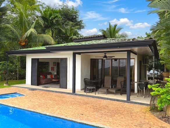 Tropical Pool House covered patio and pool with tile roof in Costa Rica