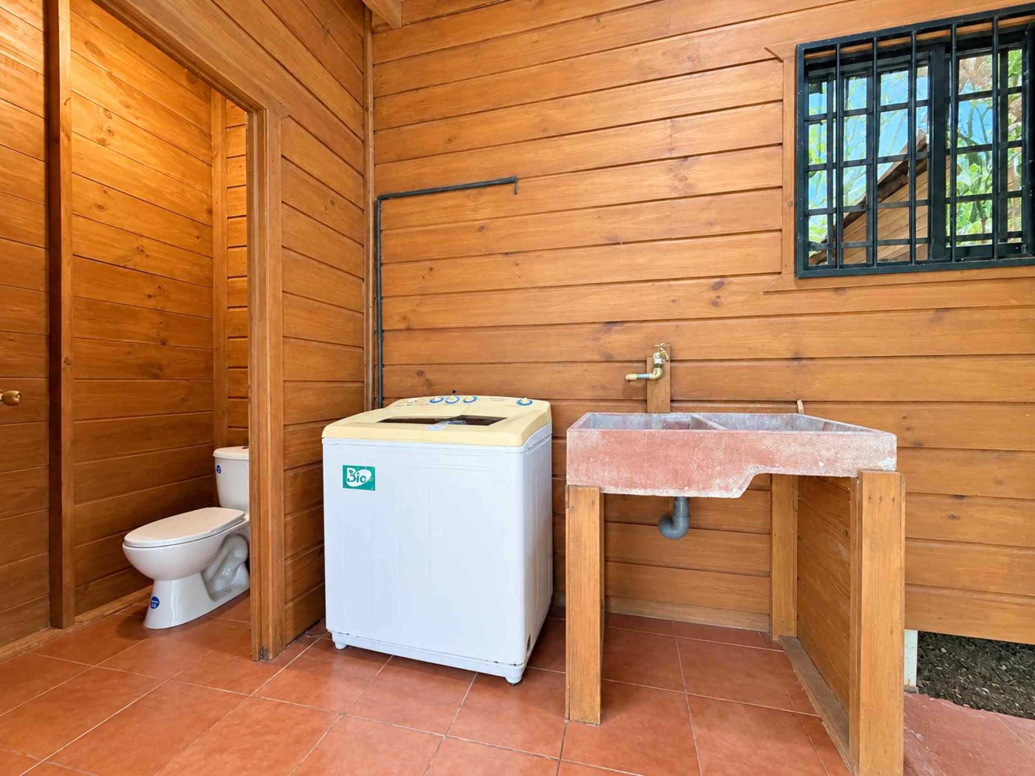 74511-7 Charming 2-Bedroom Riverside Pine Cabin with River & Jungle Views in Uvita Costa Rica