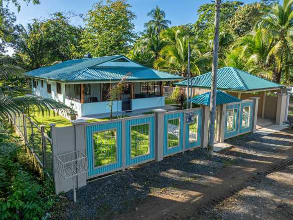 New 2-Bedroom Concrete Home with Mountain Views & Proven Rental Income in Matapalo Costa Rica