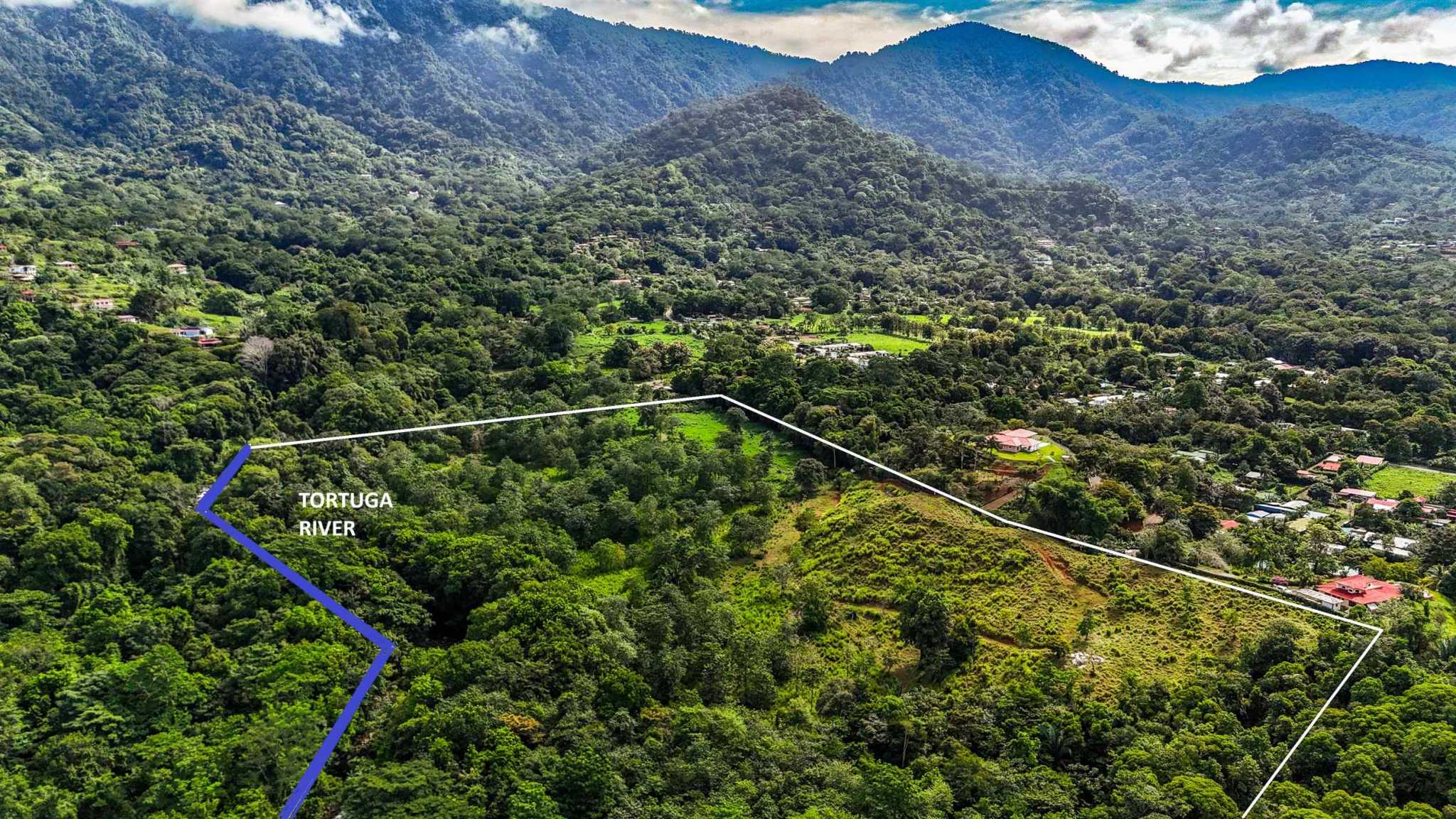 Huge Jungle View Building Lot with River Frontage and Legal Water in Ojochal Costa Rica