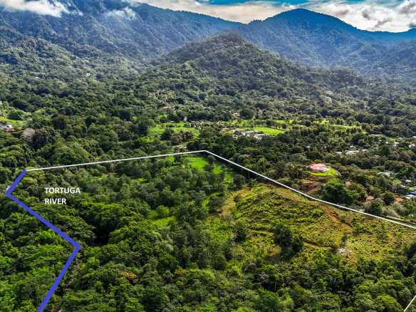 Huge Jungle View Building Lot with River Frontage and Legal Water in Ojochal Costa Rica