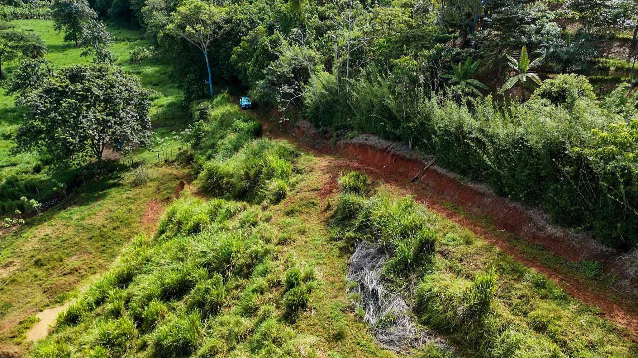 Huge Jungle View Building Lot with River Frontage and Legal Water in Ojochal Costa Rica