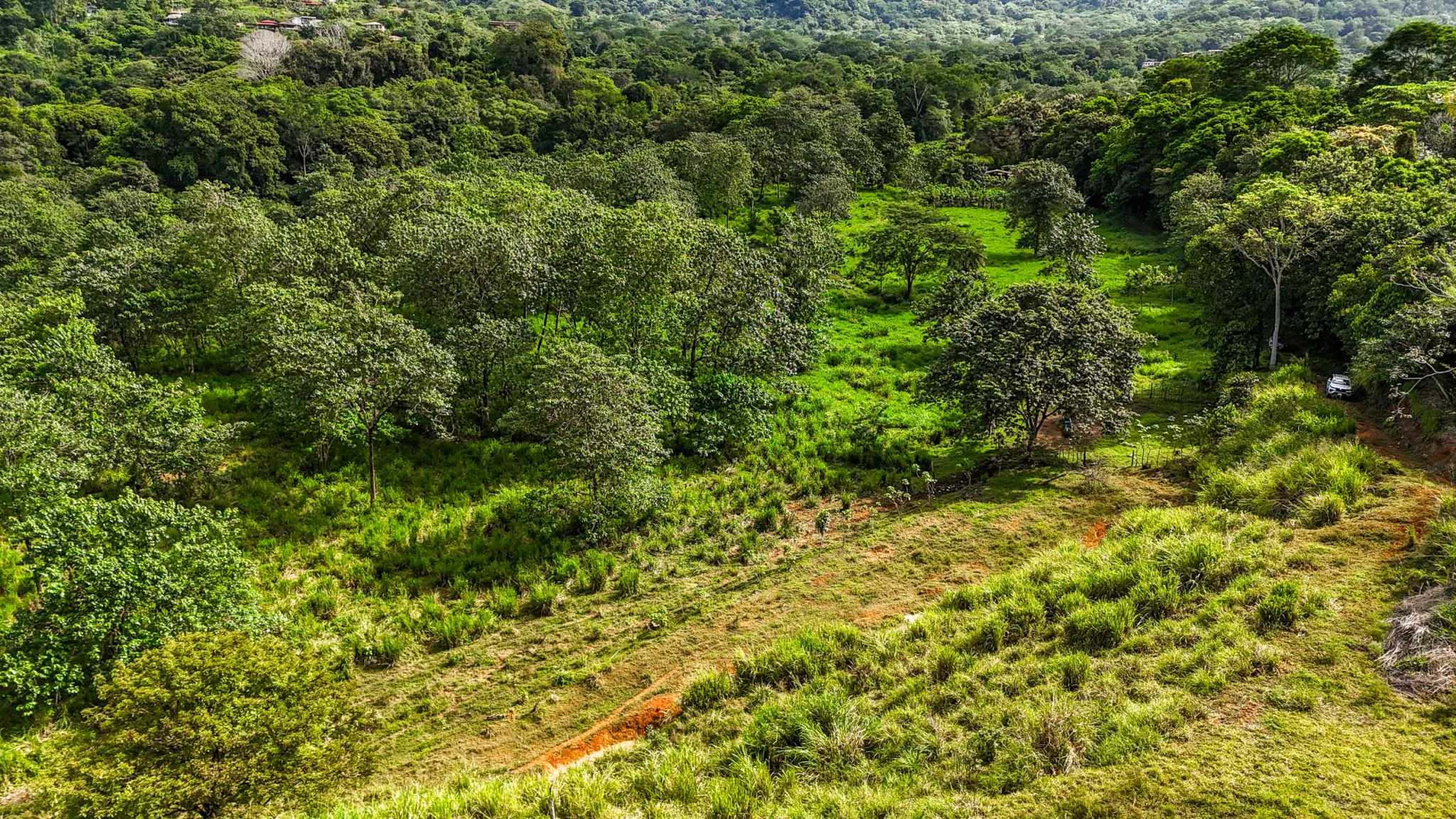 Huge Jungle View Building Lot with River Frontage and Legal Water in Ojochal Costa Rica