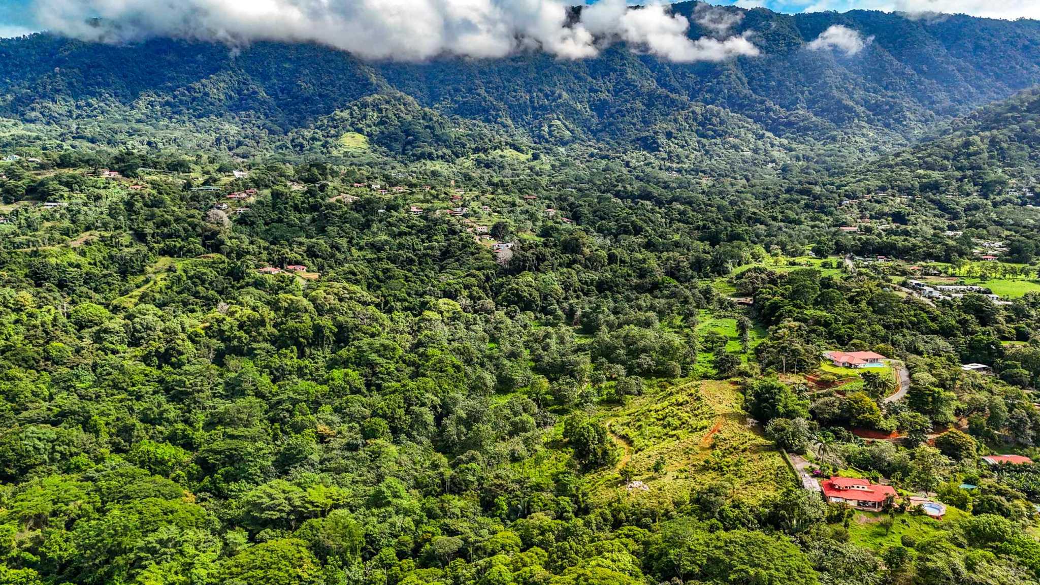 Huge Jungle View Building Lot with River Frontage and Legal Water in Ojochal Costa Rica