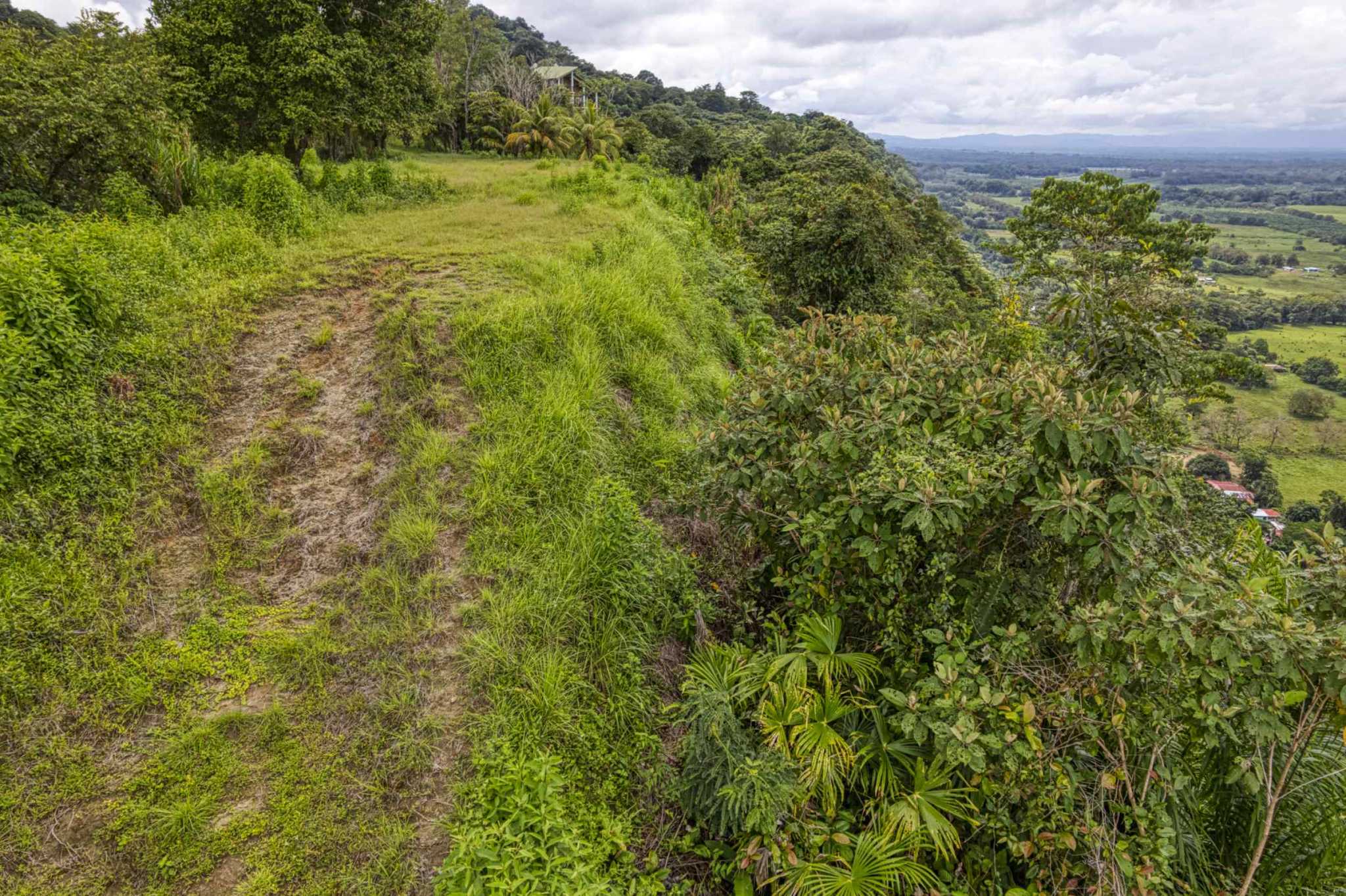 76778-25 Stunning Ocean & Mountain View Building Lot with Legal Water in Ojochal Costa Rica