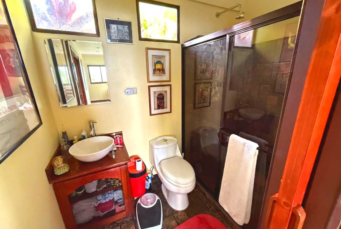 Ocean-View 3-Bedroom Home guesthouse bathroom vanity and shower in Toucan Valley/Osa Mountain Village, Costa Rica