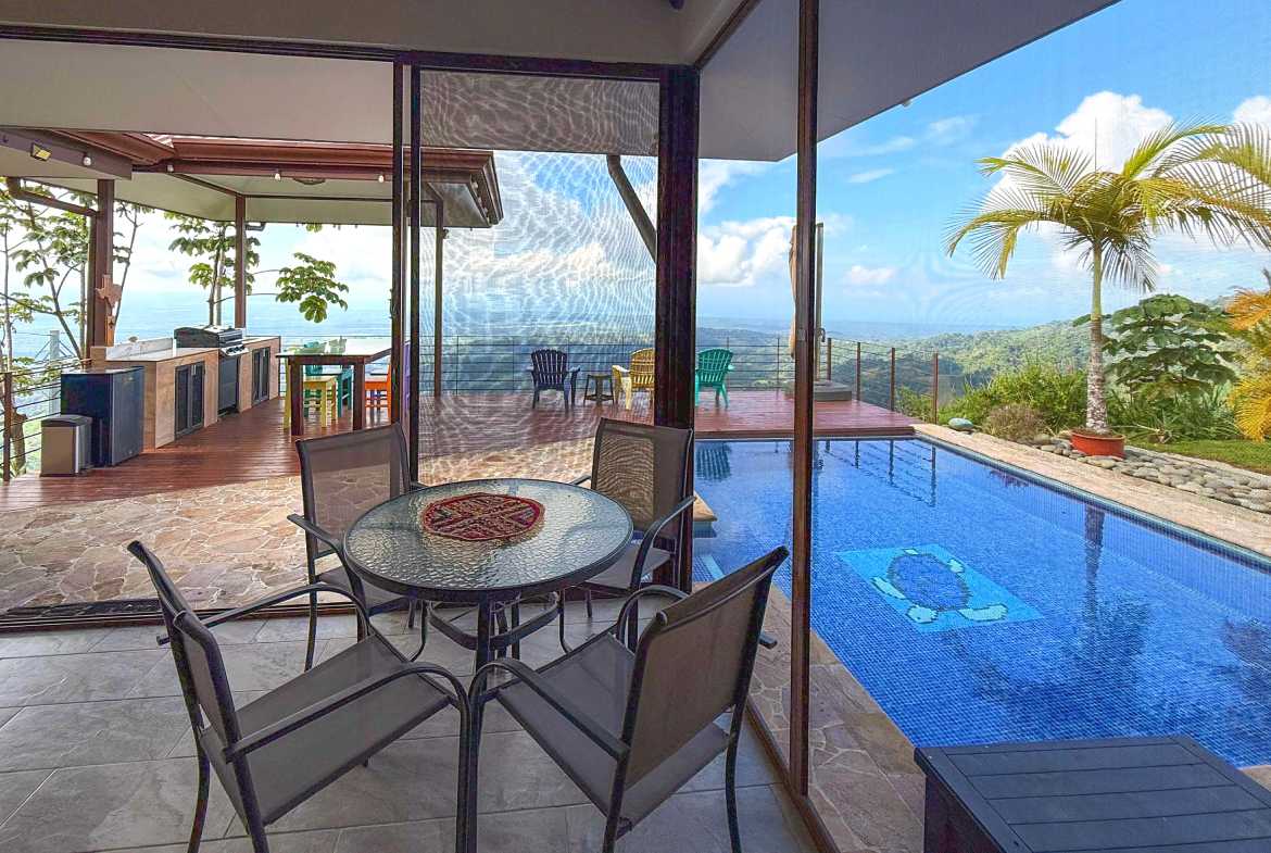 Ocean-View 3-Bedroom Home terrace dining by pool in Toucan Valley/Osa Mountain Village, Costa Rica